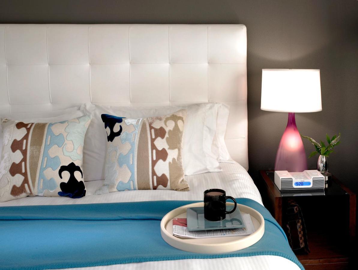 Hotel Murano Tacoma Oda fotoğraf A bedroom at the Hotel Indigo in San Francisco